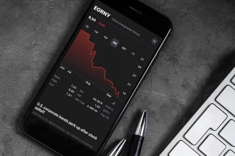 China’s Evergrande shares halt as $300 billion default looms