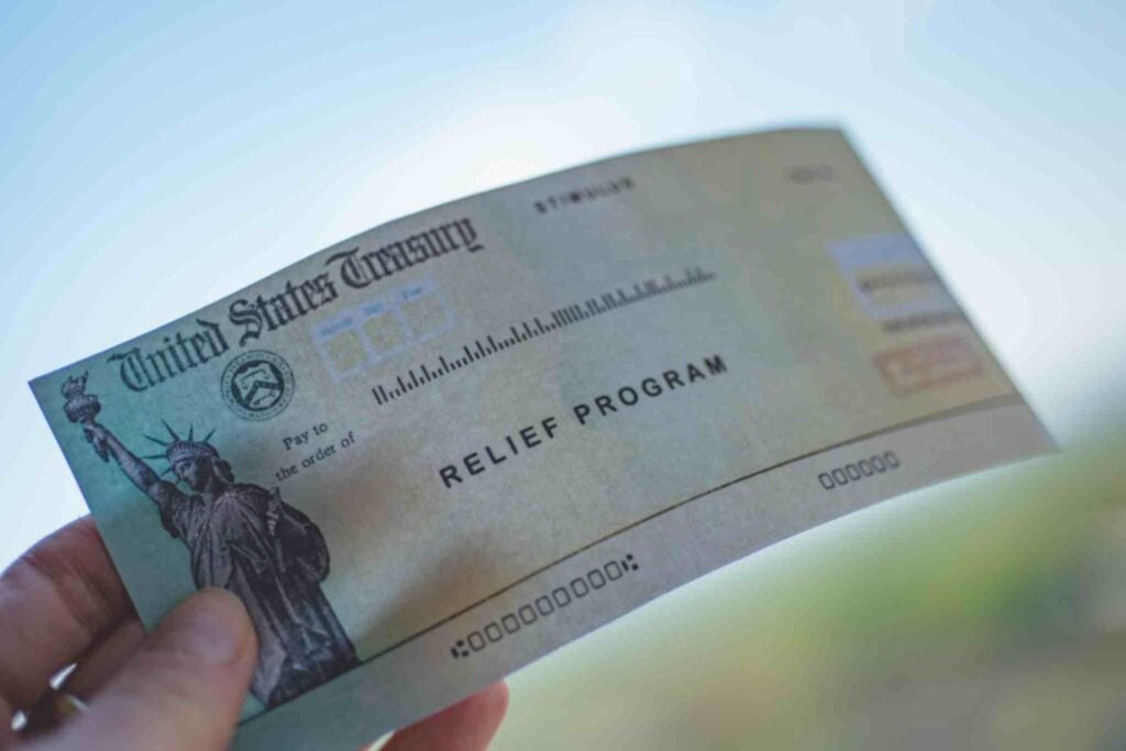 ChatGPT picks 2 cryptocurrencies to buy with your IRS stimulus check